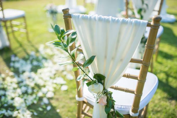 Wedding chair decorated with flowers.
